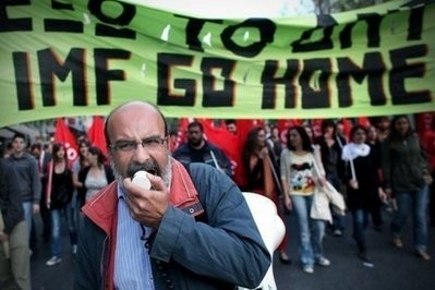 Protesters take part in a demonstration in Athens over the economic situation in Greece, April 23. Protesters take part in a demonstration in Athens over the economic situation in Greece, April 23.