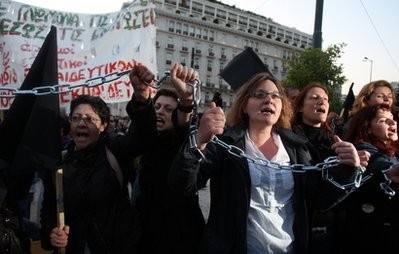 Unemployed school teachers chant slogans at an anti-government demonstration staged by civil servants outside the Greek Parliament in Athens, Tuesday, April 27, 2010. Unemployed school teachers chant slogans at an anti-government demonstration staged by civil servants outside the Greek Parliament in Athens, Tuesday, April 27, 2010.