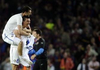 Inter Milan's Brazilian midfielder Thiago Motta (L) and Brazilian defender Lucio Da Silva Ferreira Lucimar jubilate after the UEFA Champions League semi-final second leg football match Barcelona vs Inter Milan on April 28, 2010 at the Camp Nou stadium in Barcelona. AFP photo Inter Milan's Brazilian midfielder Thiago Motta (L) and Brazilian defender Lucio Da Silva Ferreira Lucimar jubilate after the UEFA Champions League semi-final second leg football match Barcelona vs Inter Milan on April 28, 2010 at the Camp Nou stadium in Barcelona. AFP photo