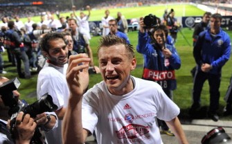 Ivica Olic celebrates after the 2nd leg UEFA Champions League semi-final match Olympique Lyonnais vs FC Bayern Munich on April 27, 2010. AFP PHOTO Ivica Olic celebrates after the 2nd leg UEFA Champions League semi-final match Olympique Lyonnais vs FC Bayern Munich on April 27, 2010. AFP PHOTO