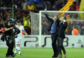 Jose Mourinho (C) celebrates after winning the UEFA Champions League semi-final second leg football match Barcelona vs Inter Milan on April 28, 2010 at the Camp Nou stadium in Barcelona. AFP photo Jose Mourinho (C) celebrates after winning the UEFA Champions League semi-final second leg football match Barcelona vs Inter Milan on April 28, 2010 at the Camp Nou stadium in Barcelona. AFP photo