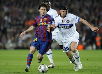 Barcelona's Argentinian forward Lionel Messi (L) vies with Inter Milan's Romanian defender Cristian Chivu (R) during the UEFA Champions League semi-final second leg football match Barcelona vs Inter Milan on April 28, 2010 at the Camp Nou stadium in Barcelona. AFP PHOTO Barcelona's Argentinian forward Lionel Messi (L) vies with Inter Milan's Romanian defender Cristian Chivu (R) during the UEFA Champions League semi-final second leg football match Barcelona vs Inter Milan on April 28, 2010 at the Camp Nou stadium in Barcelona. AFP PHOTO