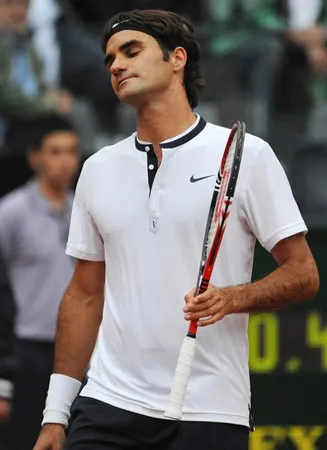 Federer thất vọng sau khi để thua Gulbis. Federer thất vọng sau khi để thua Gulbis.