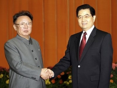 In this Jan. 17, 2006 file photo released by China's Xinhua News Agency, Chinese President Hu Jintao, right, shakes hands with North Korean leader Kim Jong Il, left, at Beijing's Great Hall of the People. In this Jan. 17, 2006 file photo released by China's Xinhua News Agency, Chinese President Hu Jintao, right, shakes hands with North Korean leader Kim Jong Il, left, at Beijing's Great Hall of the People.
