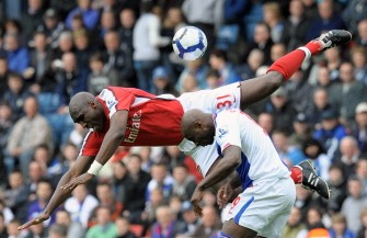 Arsenal defender Sol Campbell (up) vies with Blackburn Rovers forward Jason Roberts during their English Premier league football match on May 3, 2010. AFP photo Arsenal defender Sol Campbell (up) vies with Blackburn Rovers forward Jason Roberts during their English Premier league football match on May 3, 2010. AFP photo