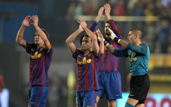 Barcelona's players wave to supporters after their Spanish league football match against Villarreal at Madrigal stadium in Villarreal on 01 May, 2010. AFP PHOTO Barcelona's players wave to supporters after their Spanish league football match against Villarreal at Madrigal stadium in Villarreal on 01 May, 2010. AFP PHOTO