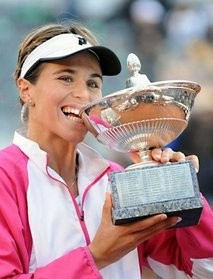 Maria Martinez-Sanchez bites the trophy after winning the WTA Rome Open. AFP photo Maria Martinez-Sanchez bites the trophy after winning the WTA Rome Open. AFP photo