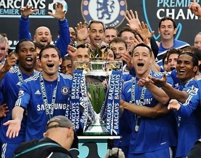 Chelsea players celebrate with the Premier League trophy after the squad won the Premiership title with a 8-0 victory over Wigan Athletic Chelsea players celebrate with the Premier League trophy after the squad won the Premiership title with a 8-0 victory over Wigan Athletic
