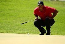 Tiger Woods lines up his putt on the first green during the final round of The Players Championship at TPC Sawgrass in Ponte Vedra Beach, Florida. AFP photo Tiger Woods lines up his putt on the first green during the final round of The Players Championship at TPC Sawgrass in Ponte Vedra Beach, Florida. AFP photo