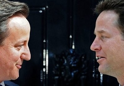 Britain's new Prime Minister David Cameron (L) and new Deputy Prime Minister Nick Clegg, pose for pictures on the steps of 10 Downing Street in London. Britain's new Prime Minister David Cameron (L) and new Deputy Prime Minister Nick Clegg, pose for pictures on the steps of 10 Downing Street in London.
