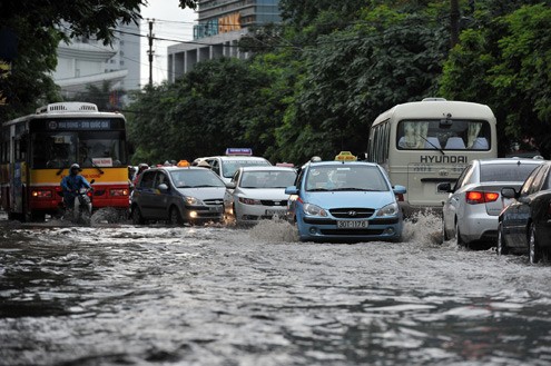 A street in Hanoi flooded after one hour rain on May 15 A street in Hanoi flooded after one hour rain on May 15