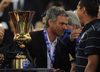 Mourinho celebrates with the Cup after Inter Milan defeated AS Roma in the Italian Cup final on May 5, 2010 at Olimpico stadium in Rome. AFP photo Mourinho celebrates with the Cup after Inter Milan defeated AS Roma in the Italian Cup final on May 5, 2010 at Olimpico stadium in Rome. AFP photo