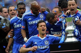 Michael Ballack (Foreground) celebrates with the FA Cup after beating Portsmouth 1-0 during the FA Cup Final football match at Wembley, in north London, on May 15, 2010. AFP PHOTO Michael Ballack (Foreground) celebrates with the FA Cup after beating Portsmouth 1-0 during the FA Cup Final football match at Wembley, in north London, on May 15, 2010. AFP PHOTO