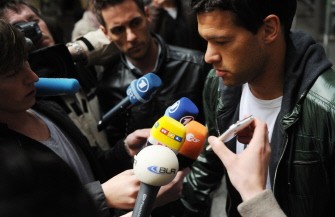 Michael Ballack, captain of the German national football team, addresses journalists as he leaves the practice of sport medicine specialist Hans-Wilhelm Mueller-Wohlfahrt on May 17, 2010 in Munich, southern Germany. AFP photo Michael Ballack, captain of the German national football team, addresses journalists as he leaves the practice of sport medicine specialist Hans-Wilhelm Mueller-Wohlfahrt on May 17, 2010 in Munich, southern Germany. AFP photo