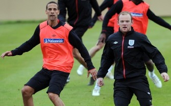 England footballers Rio Ferdinand (L) and Wayne Rooney take part in a training session of the English national football team in Irdning, Austria on May 19, 2010 (AFP photo) England footballers Rio Ferdinand (L) and Wayne Rooney take part in a training session of the English national football team in Irdning, Austria on May 19, 2010 (AFP photo)