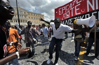 Migrant workers perform during a protest marking the 24-hours general strike against the austerity measures in central Athens, Greece on May 20, 2010. AFP photo Migrant workers perform during a protest marking the 24-hours general strike against the austerity measures in central Athens, Greece on May 20, 2010. AFP photo