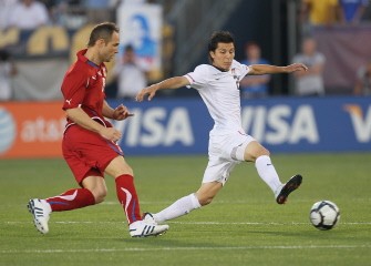 Jonathan Spector #2 of the United States battles Jan Polak #8 of the Czech Republic. AFP photo Jonathan Spector #2 of the United States battles Jan Polak #8 of the Czech Republic. AFP photo