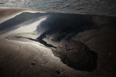 Oil floats ashore at the Grand Isle East State Park on Grand Isle, Louisiana. Oil floats ashore at the Grand Isle East State Park on Grand Isle, Louisiana.