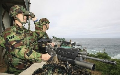 South Korean soldiers man a guard post in Gangneung, east of Seoul, South Korea, South Korean soldiers man a guard post in Gangneung, east of Seoul, South Korea,