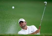 Blake Adams plays a bunker shot on the second hole during the first round of the 2010 Crowne Plaza Invitational. AFP photo Blake Adams plays a bunker shot on the second hole during the first round of the 2010 Crowne Plaza Invitational. AFP photo