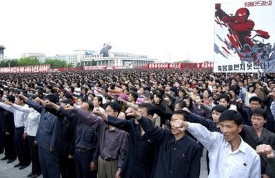 North Koreans shout slogans at the Kim Il Sung Square in Pyongyang, North Koreans shout slogans at the Kim Il Sung Square in Pyongyang,