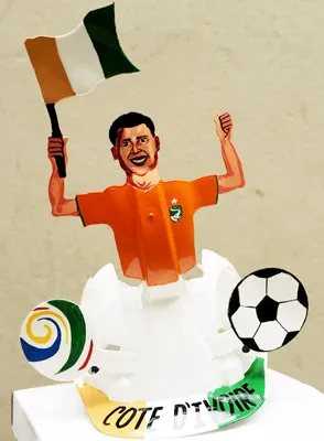 Một chiếc nón thiết kế dành riêng cho các CĐV Bờ Biển Ngà tại World Cup. Một chiếc nón thiết kế dành riêng cho các CĐV Bờ Biển Ngà tại World Cup.