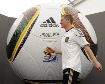 German midfielder Bastian Schweinsteiger walks past a giant replica of Jabulani, the official ball of the FIFA 2010 Football World Cup following a press conference in Appiano, northern Germany June 1, 2010. AFP photo German midfielder Bastian Schweinsteiger walks past a giant replica of Jabulani, the official ball of the FIFA 2010 Football World Cup following a press conference in Appiano, northern Germany June 1, 2010. AFP photo