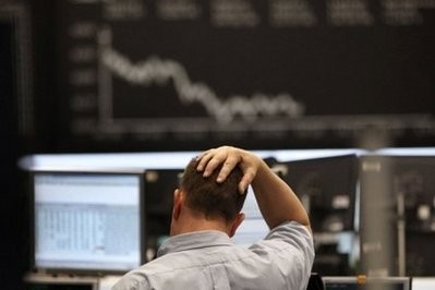 A trader is seen at Germany's stock exchange in Frankfurt. AFP photo A trader is seen at Germany's stock exchange in Frankfurt. AFP photo
