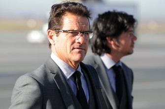 Coach Fabio Capello (L) arrives at Johannesburg Airport in South Africa on June 3, 2010. AFP photo Coach Fabio Capello (L) arrives at Johannesburg Airport in South Africa on June 3, 2010. AFP photo