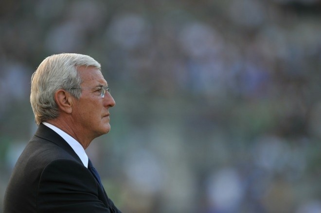 Italy's coach Marcello Lippi looks out before the friendly football match match Italy vs Mexico at the Heizel stadium in Brussels on June 3, 2010. AFP photo Italy's coach Marcello Lippi looks out before the friendly football match match Italy vs Mexico at the Heizel stadium in Brussels on June 3, 2010. AFP photo