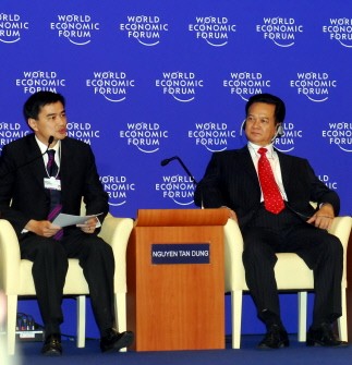Thai PM Abhisit Vejjajiva (L) speaks as Vietnamese PM Nguyen Tan Dung listens during the World Economic Forum on East Asia being held in Ho Chi Minh City on June 6, 2010. AFP PHOTO Thai PM Abhisit Vejjajiva (L) speaks as Vietnamese PM Nguyen Tan Dung listens during the World Economic Forum on East Asia being held in Ho Chi Minh City on June 6, 2010. AFP PHOTO