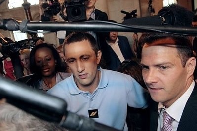 French alleged rogue trader Jerome Kerviel (R) is surrounded by journalists as he arrives for his trial at Paris courthouse. French alleged rogue trader Jerome Kerviel (R) is surrounded by journalists as he arrives for his trial at Paris courthouse.
