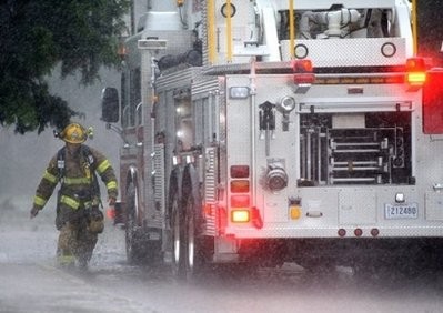 File picture shows firefighters responding to a call during a storm. AFP photo File picture shows firefighters responding to a call during a storm. AFP photo