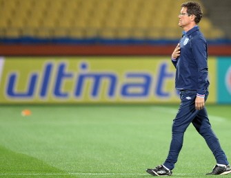 England's coach Fabio Capello arrives for a team training session in Rustenburg on June 11, 2010. AFP PHOTO England's coach Fabio Capello arrives for a team training session in Rustenburg on June 11, 2010. AFP PHOTO