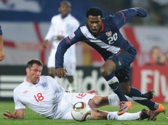 US striker Robbie Findley (R) is tackled by England's defender Jamie Carragher during the Group C first round 2010 World Cup football match England vs. USA on June 12, 2010 US striker Robbie Findley (R) is tackled by England's defender Jamie Carragher during the Group C first round 2010 World Cup football match England vs. USA on June 12, 2010