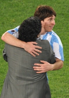 Diego Maradona (L) hugs Lionel Messi after Group B first round 2010 World Cup football match on June 12, 2010 at Ellis Park stadium in Johannesburg Diego Maradona (L) hugs Lionel Messi after Group B first round 2010 World Cup football match on June 12, 2010 at Ellis Park stadium in Johannesburg