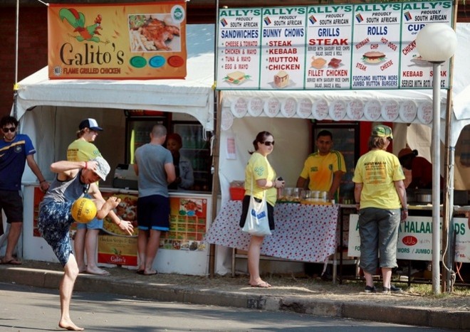 Australian fans purchase food from stalls on the grounds of the Kingsmead Sahara Cricket Grounds in Durban on June 12, 2010 Australian fans purchase food from stalls on the grounds of the Kingsmead Sahara Cricket Grounds in Durban on June 12, 2010