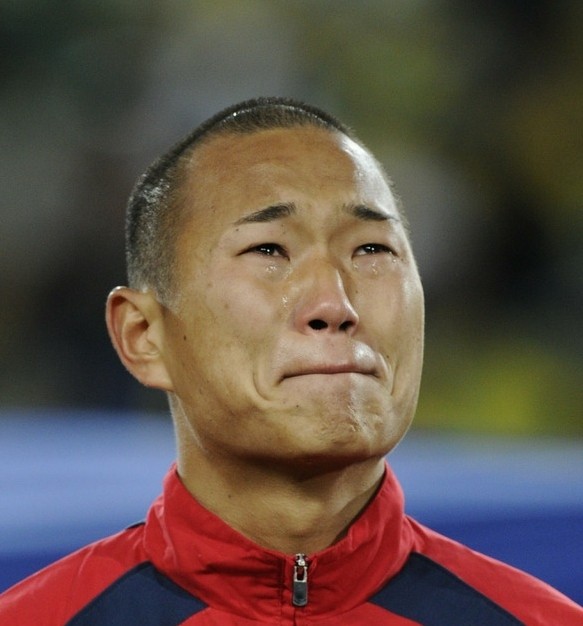 North Korea's Jong Tae-Se cries as he hears his national anthem before their World Cup football match against Brazil on June 15, 2010. AFP photo North Korea's Jong Tae-Se cries as he hears his national anthem before their World Cup football match against Brazil on June 15, 2010. AFP photo