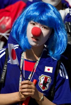 A supporter of Japan awaits on June 19, 2010, the start of the World Cup match Netherlands vs. Japan at Moses Mabhida stadium in Durban. AFP