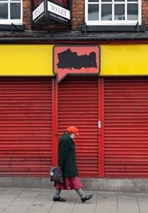 (AFP file) A woman walks past a vacant shop in Cheshire, north-west England. (AFP file) A woman walks past a vacant shop in Cheshire, north-west England.