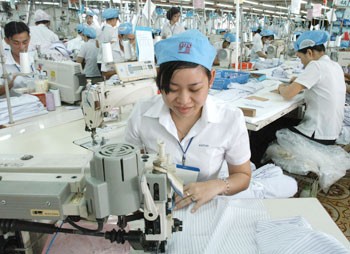 Workers sew T-shirts for export at Viet Tien Garment Company in Ho Chi Minh City Workers sew T-shirts for export at Viet Tien Garment Company in Ho Chi Minh City
