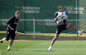 David James (R) and midfielder Steven Gerrard compete for the ball during a training session at the Royal Bafokeng Sports Campus near Rustenburg on 26 June. AFP David James (R) and midfielder Steven Gerrard compete for the ball during a training session at the Royal Bafokeng Sports Campus near Rustenburg on 26 June. AFP
