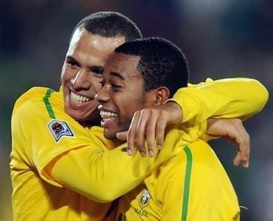 Brazilian striker Robinho (R) is congratulated by teammate Luis Fabiano after scoring the opening goal against Chile. Brazil won 3-0. AFP Brazilian striker Robinho (R) is congratulated by teammate Luis Fabiano after scoring the opening goal against Chile. Brazil won 3-0. AFP