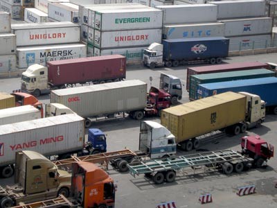 (Files) Containers of goods seen at a port in Ho Chi Minh City (Files) Containers of goods seen at a port in Ho Chi Minh City
