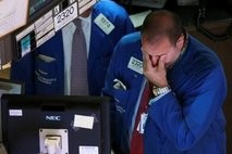 (AFP file) A trader reacts during trading at the New York Stock Exchange. (AFP file) A trader reacts during trading at the New York Stock Exchange.