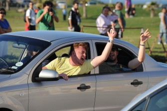 A fan of Brazil's football gestures and yells complaints against Brazil's coach Dunga while passing the team's hotel on July 03, 2010 in Port Elizabeth, South Africa. AFP A fan of Brazil's football gestures and yells complaints against Brazil's coach Dunga while passing the team's hotel on July 03, 2010 in Port Elizabeth, South Africa. AFP