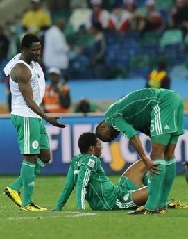 Nigeria's defender Rabiu Afolabi (R) and teammates look dejecting after being knocked out of the World Cup by South Korea. AFP Nigeria's defender Rabiu Afolabi (R) and teammates look dejecting after being knocked out of the World Cup by South Korea. AFP