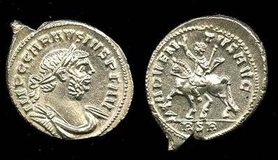 In this undated image made available Thursday July 8, 2010, from British Museum, showing a coin from the ruler Marcus Aurelius Carausius, among a hoard found by treasure hunter Dave Crisp in a field near Frome, England. In this undated image made available Thursday July 8, 2010, from British Museum, showing a coin from the ruler Marcus Aurelius Carausius, among a hoard found by treasure hunter Dave Crisp in a field near Frome, England.