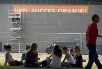 People hang a banner reading "Lot's of Success to Orange" in honor of the Dutch National football team at the The Van Gogh Museum in Amsterdam on July 9, 2010. AFP People hang a banner reading "Lot's of Success to Orange" in honor of the Dutch National football team at the The Van Gogh Museum in Amsterdam on July 9, 2010. AFP