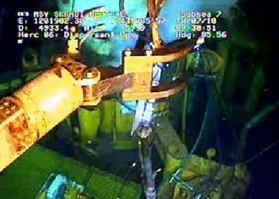 This still image from a live BP video feed shows robots working to replace the cap on a gushing well in the Gulf of Mexico. AFP This still image from a live BP video feed shows robots working to replace the cap on a gushing well in the Gulf of Mexico. AFP